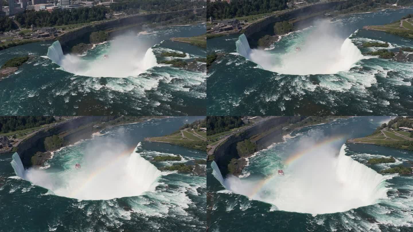 尼亚加拉马蹄瀑布航拍，巨大的水流从瀑布流下，水雾上有彩虹