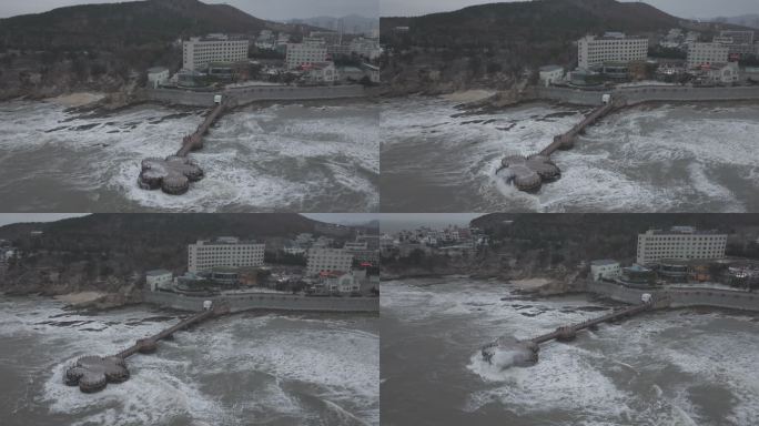 航拍山东威海金海湾栈桥暴风雪狂风巨浪