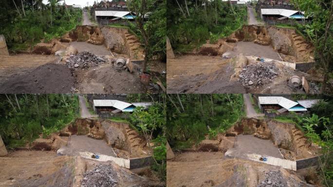 部分被毁道路的地面工程现场，航拍照片