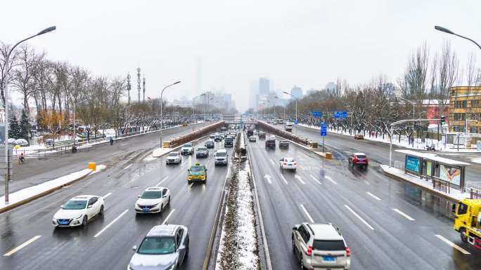北京冬季白天下雪天三环路车流延时