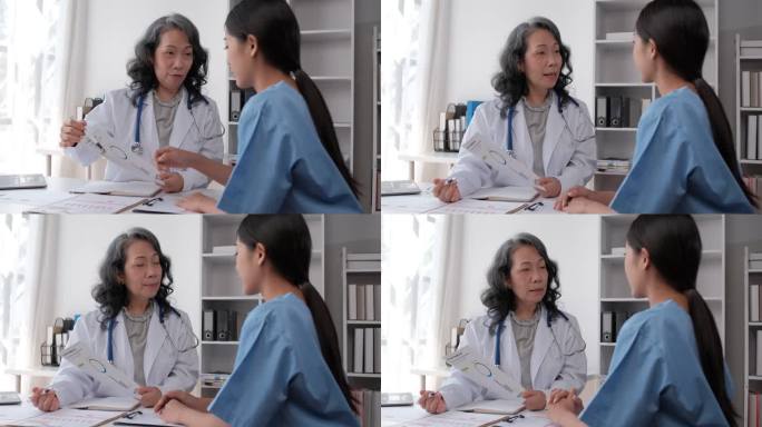 在医院的观察室里，一位资深女医生正在给医科学生提供建议。
