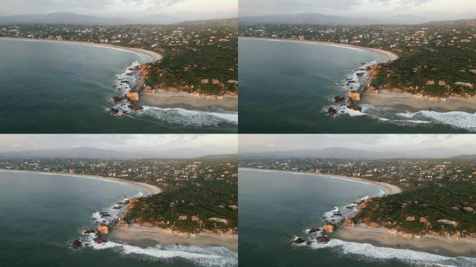 从高空俯瞰日落时墨西哥瓦哈卡州埃斯孔迪多港的拉蓬塔·齐卡特拉海滩