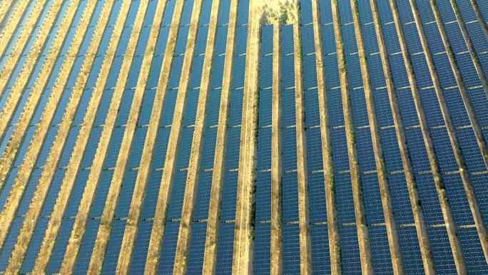 无人机太阳能电池板，农业和光伏电网的可再生能源，可持续发展和生态友好型电力。鸟瞰图无限发电厂或板为农