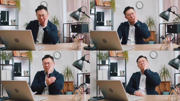 商人摸着脸颊，闭着眼睛，表情可怕，牙疼得厉害