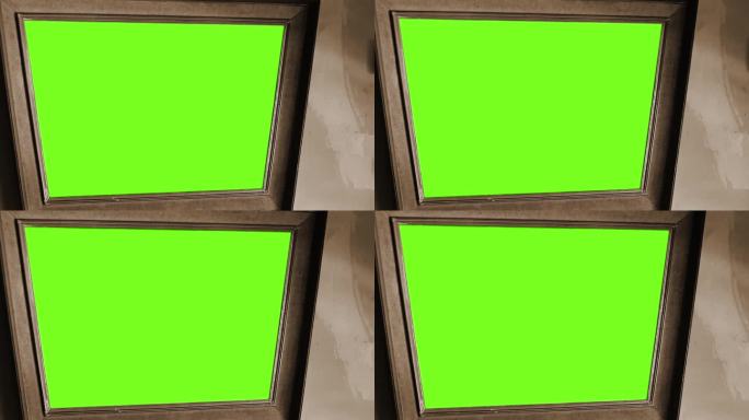 绿屏木框壁挂式镜子。关闭了。放大。深褐色的基调。