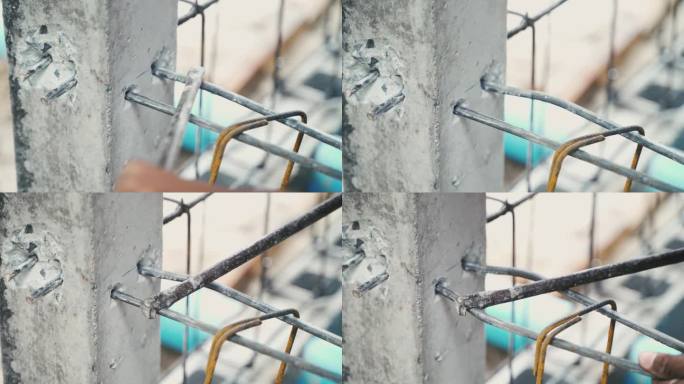 建筑工人将钢筋与钢筋网连接起来，作为线材建筑板的一部分，金属结构在现场退火钢捆绑，在室外建造房屋的工