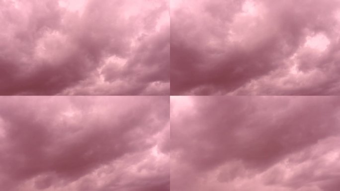 宁静迷人的粉色云朵。细腻的色调勾勒出宁静的氛围。梦幻的全景。无论是日落还是日出。飘渺的云。粉红色的云