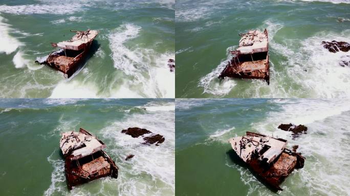 无人机绕着奥弗伯格阿古拉斯角海岸线上风化的沉船飞行