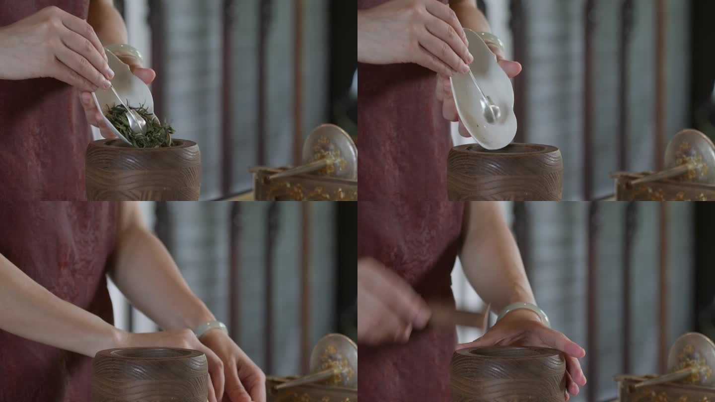 将茶叶放在研磨机上，准备传统的中国茶道。