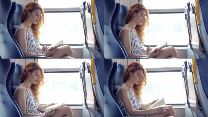 年轻漂亮的女人去度假，坐在火车上看书