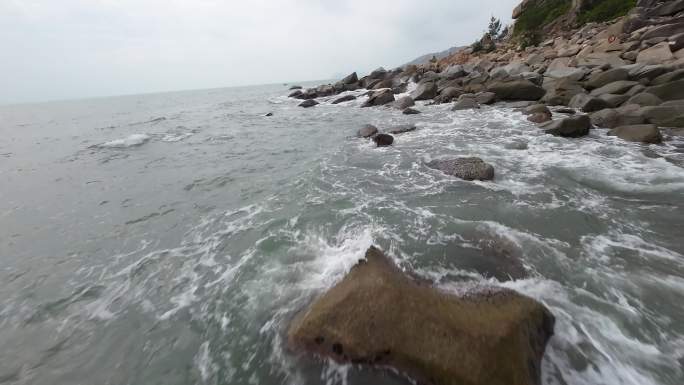 惠州双月湾海滩穿越机飞行海浪