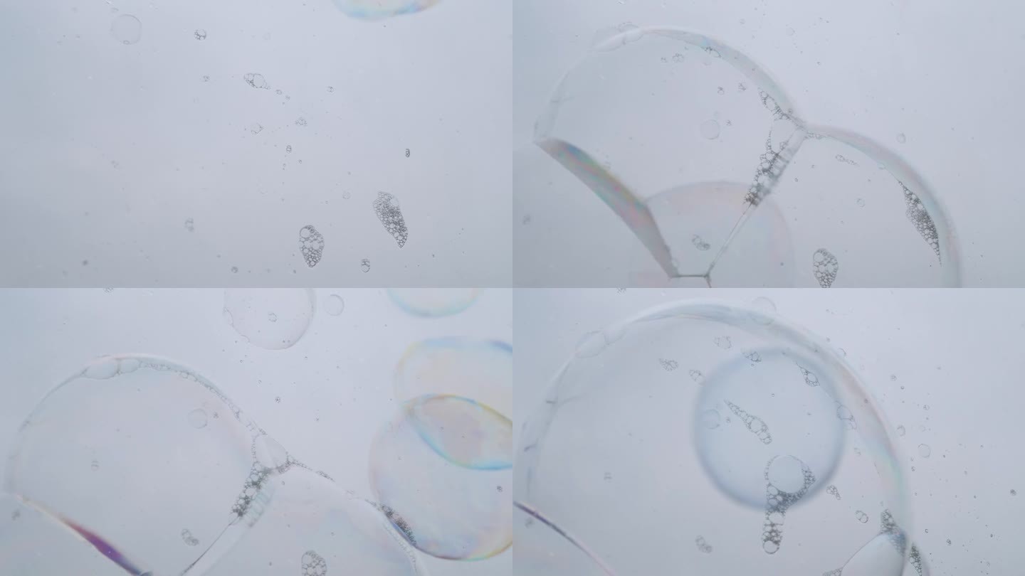 湿透明玻璃表面有许多粘性的彩色肥皂泡