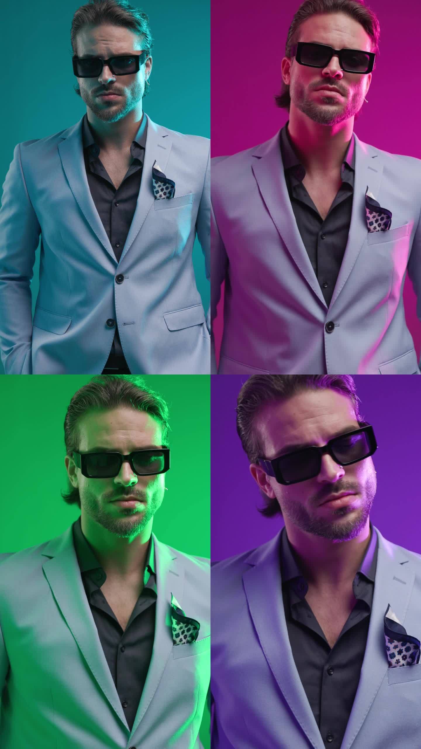 项目视频酷帅的男子与太阳镜手在口袋里看着一边，并在彩色背景前自信
