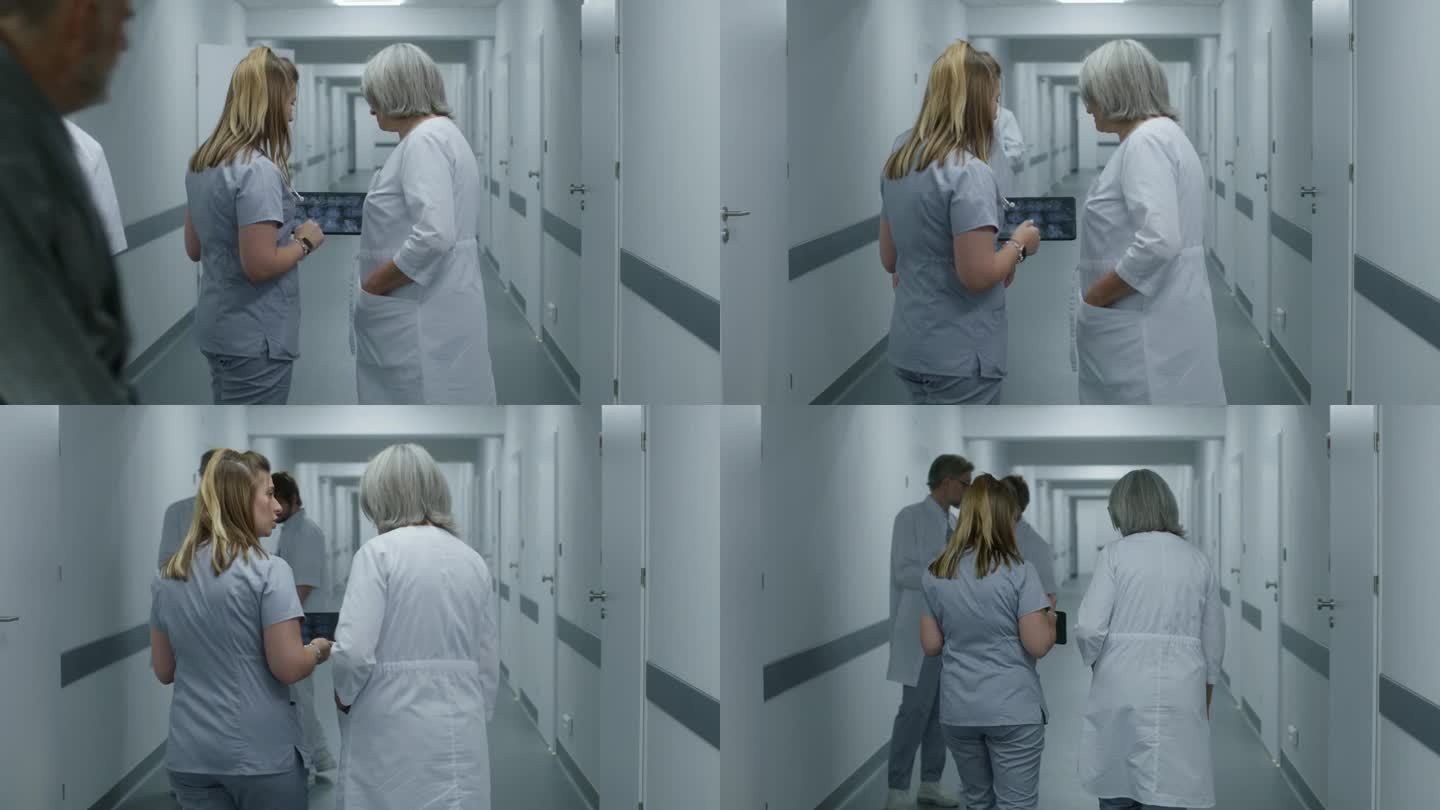 护士在诊所走廊用药片向女医生展示MRI扫描图像