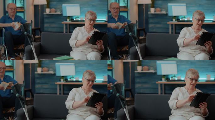退休妇女在家用平板电脑上网