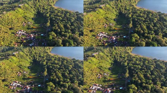 Pura Ulun Danu Tamblingan湖寺庙的空中无人机日出场景，印度尼西亚巴厘岛