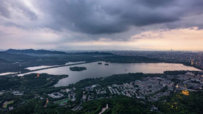 杭州地标西湖全景乌云暴雨来袭航拍延时