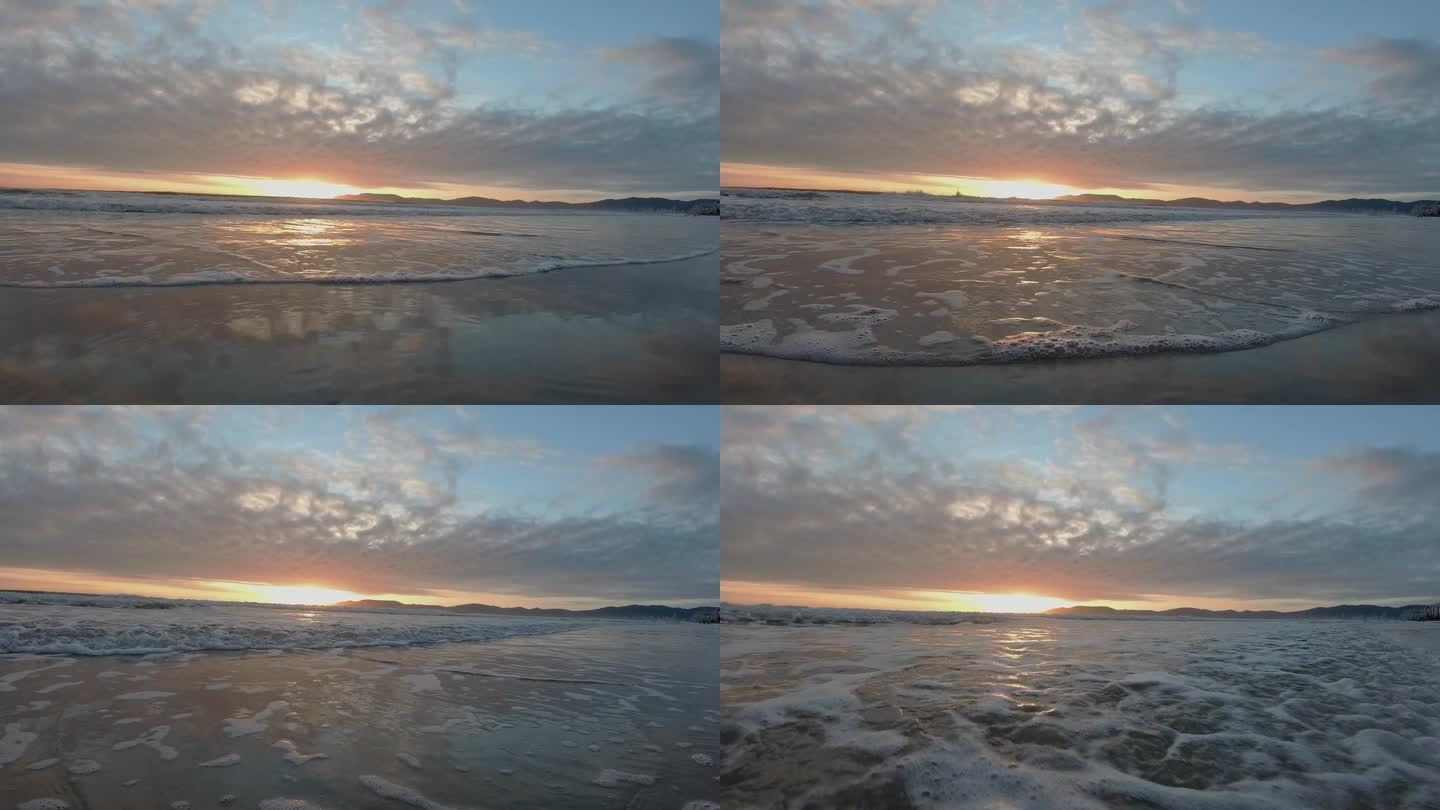 日出时海滩上海浪的详细场景