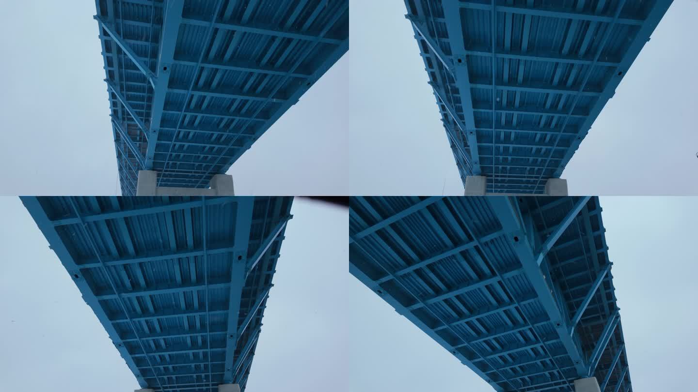 4k实拍雪花从桥上落下