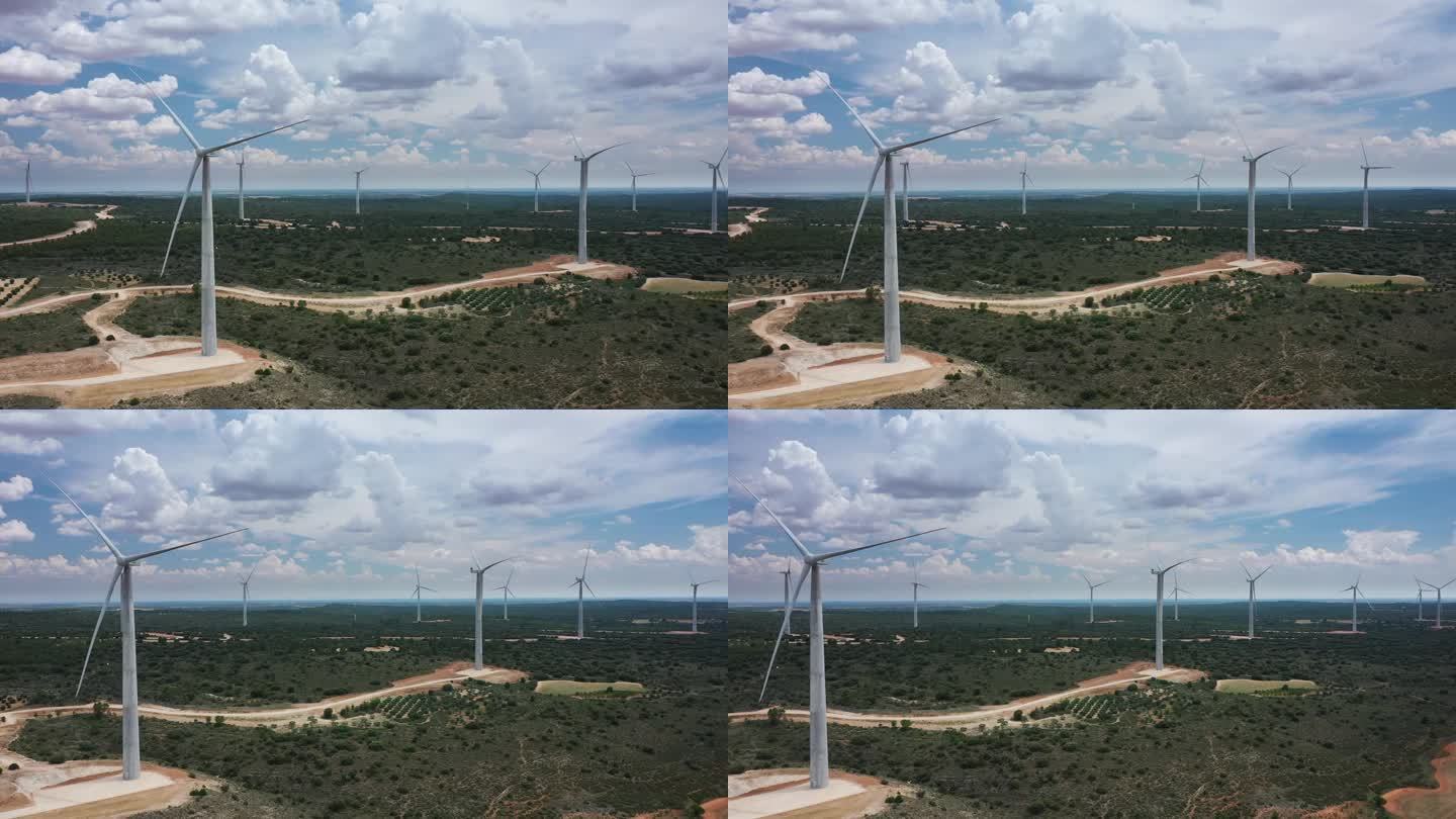 风力涡轮机-清洁能源，鸟瞰图-无人机视频，开阔的空间，夏日晴朗的日子，美丽的云，西班牙。