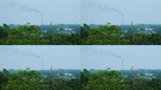 煤气站在森林中危害环境，污染生态系统。全球变暖的概念。孟加拉国天然气田工业