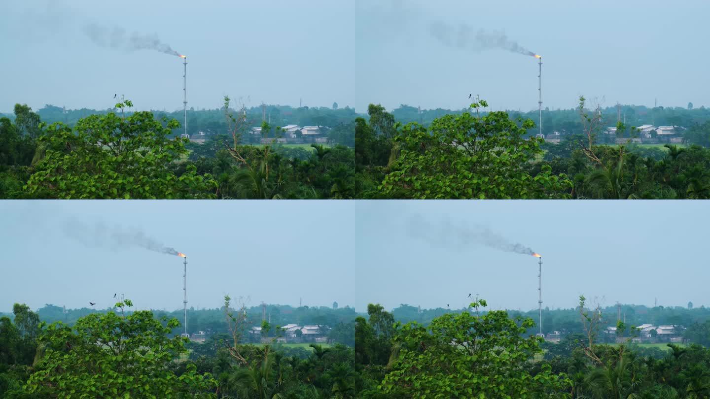 煤气站在森林中危害环境，污染生态系统。全球变暖的概念。孟加拉国天然气田工业