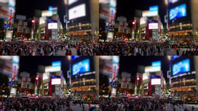 东京街道上的人群。大型广告显示屏
