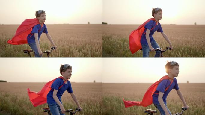 小男孩小男孩小男孩超级英雄在快乐的家庭活动骑自行车生活方式夏日麦田日落。概念童年梦想赢成功赢家英雄胜