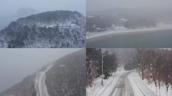 航拍冬天下雪道路车流棒棰岛滨海路雪景雪