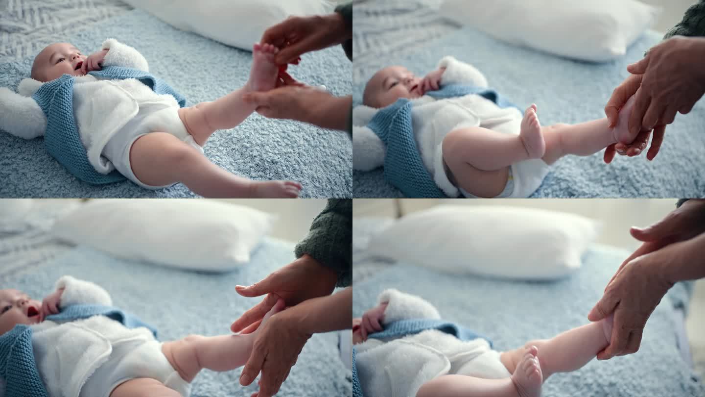 宝宝的脚，手和腿部乳液与一个人在家里的爱，关心和支持一起。床，脚和快乐的孩子在一个房子里，为新生儿护