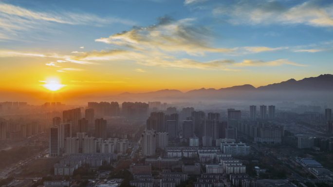 冬日朝阳照耀下的九江城景航拍延时