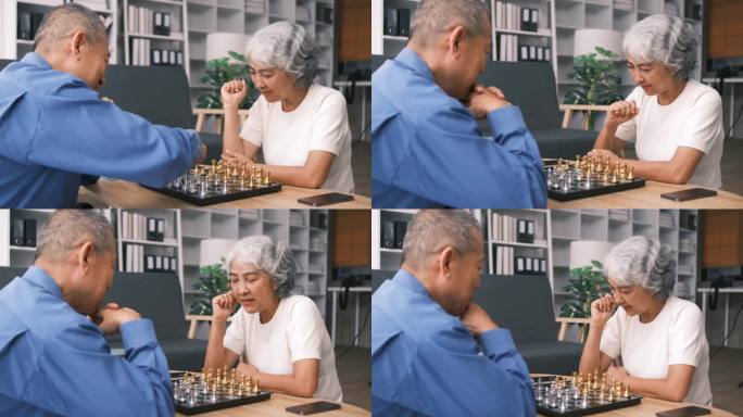 老年人男女穿着休闲装在养老院下棋，围坐在桌子旁，喝茶吃饼干，玩桌上游戏，编织，共度时光