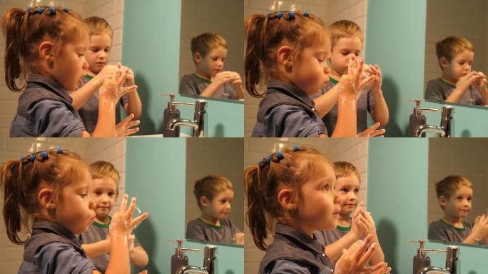 逗小朋友弟弟和妹妹在浴室里用手做肥皂泡