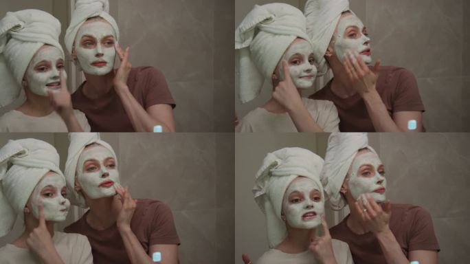妈妈和女儿用粘土面膜敷脸