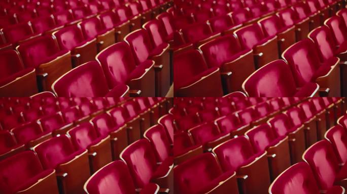 在电影院空旷的红色音乐会座位上缓慢而梦幻般的移动