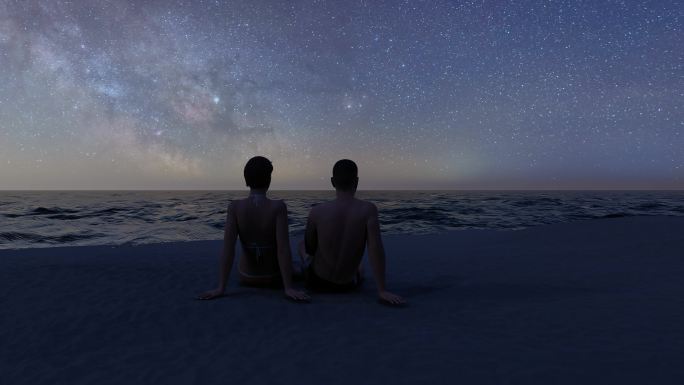 夜晚星空海边情侣看大海