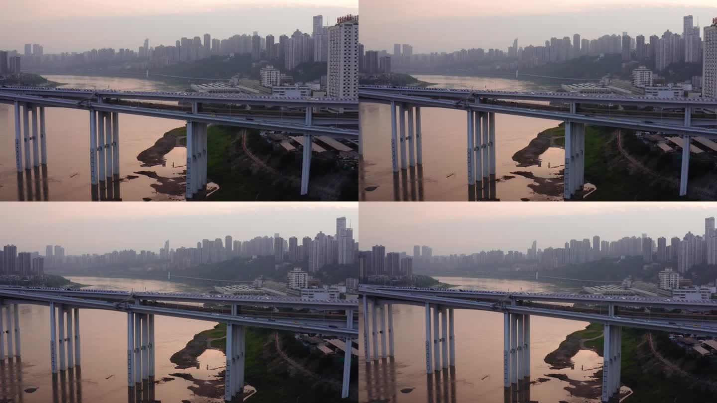 繁忙的公路桥与中国重庆的天际线相接，空中货车行驶