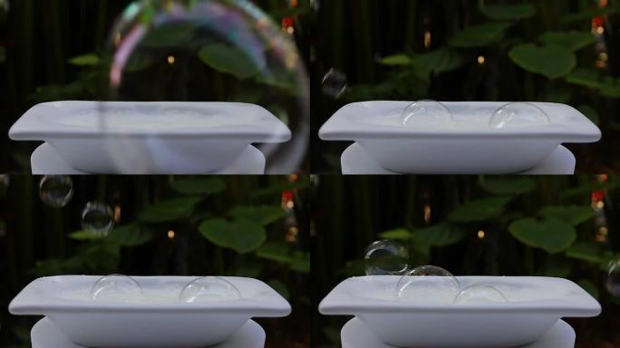 现代陶瓷浴缸。肥皂泡沫。沐浴液。在自然背景下被隔离。