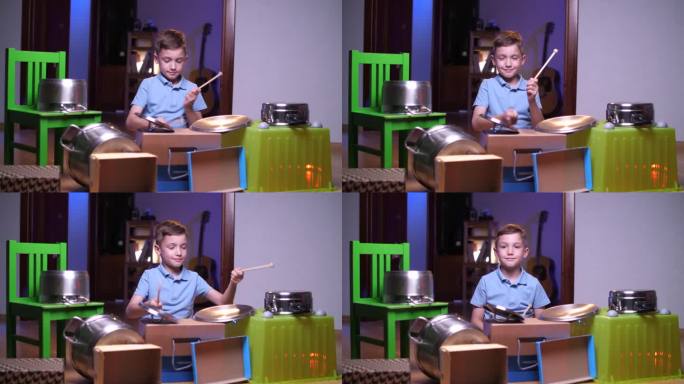 男孩用家里的架子鼓，男孩用鼓敲罐子和盒子