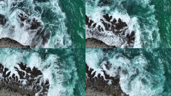 印度尼西亚巴厘岛海水击打礁石溅起浪花特写