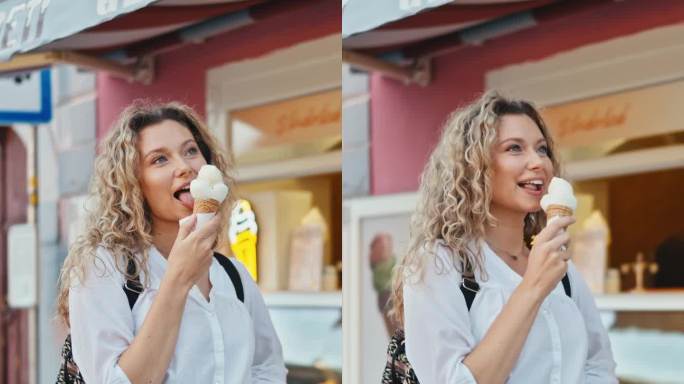 快乐的年轻女子在Ptuj - VERTICAL镇的商店外吃冰淇淋蛋筒