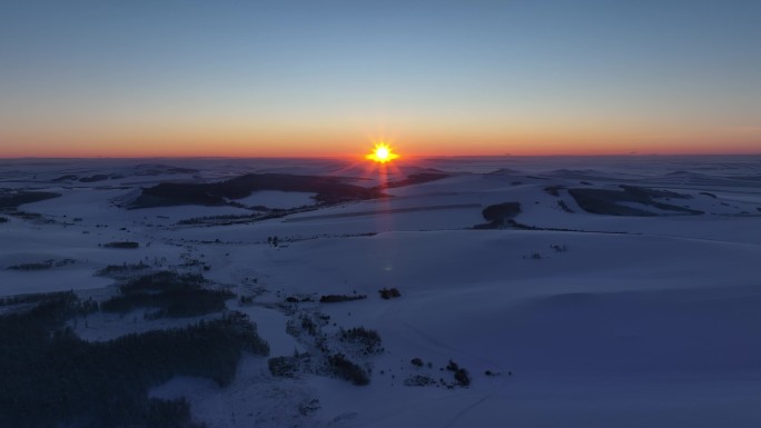 呼伦贝尔雪景丘陵雪野夕阳寒冬风景