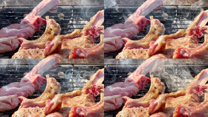 在烤架上用盐给羊排调味。切碎的羊排骨。在明火上煮熟的肉制品。近距离烧烤。