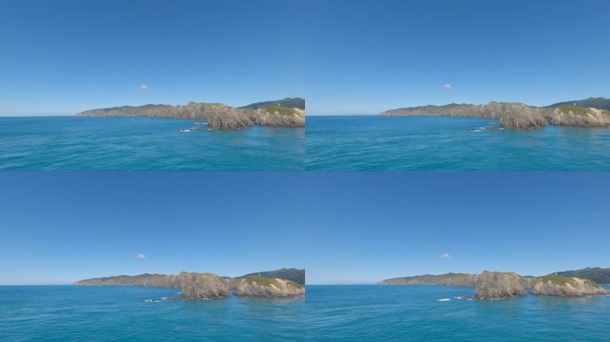 托里海峡入口处(南岛顶端)被侵蚀的悬崖与绿松石色的美丽大海形成鲜明对比(库克海峡穿越，新西兰)