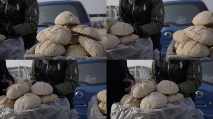 新疆吐鲁番集市美食新疆开车卖馕大饼人文
