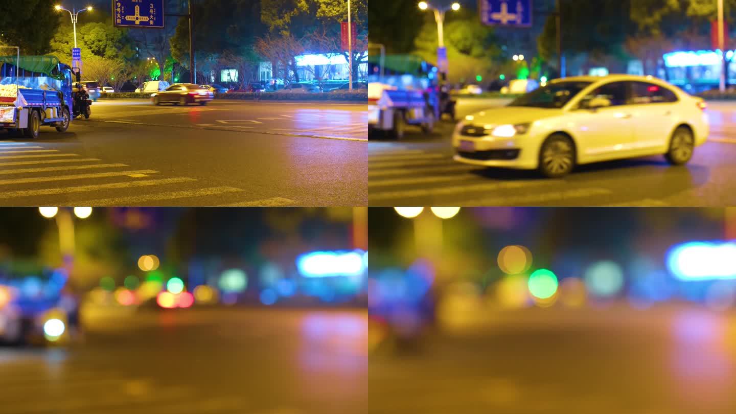 杭州城市夜晚街头汽车车流人流夜景光斑视频