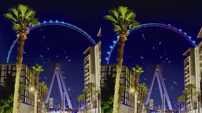 蓝水岛拥有现代建筑和摩天轮底部的航拍夜景。迪拜码头和JBR附近的新休闲和住宅区