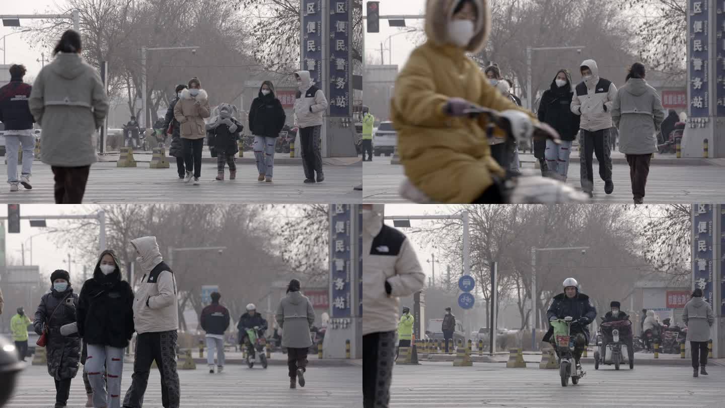 新疆吐鲁番冬天冬季街上街道走路来往的人群