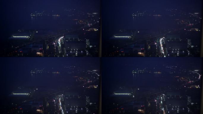 大阪关西国际机场海湾地区夜间延时鸟瞰海洋建筑照明4k