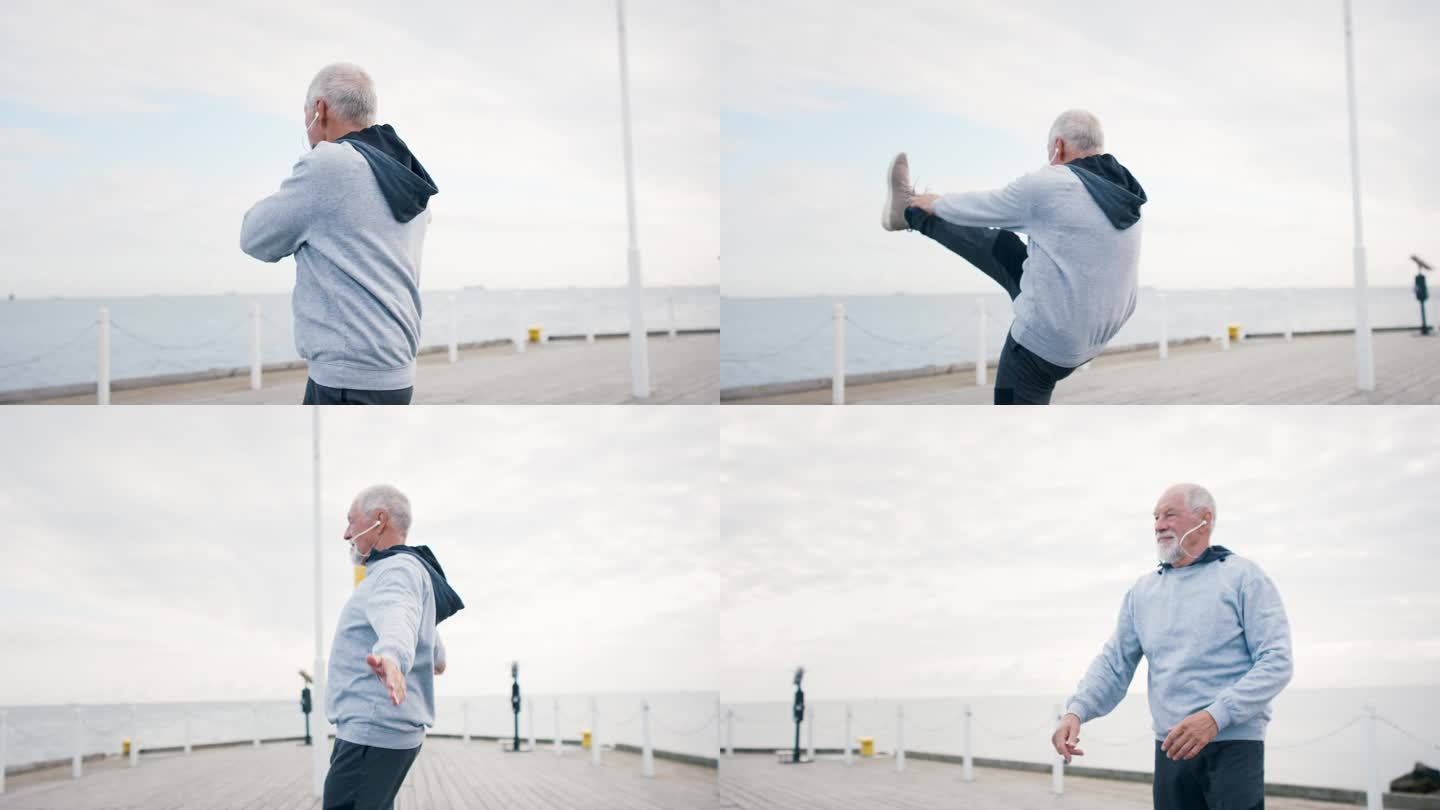 清晨，老人在海边的码头上，跑步后伸懒腰。